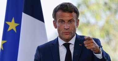 French President Emmanuel Macron delivers a speech during a meeting with members of the French community at the French ambassador to Algeria's residence, in Algiers, Aug. 26, 2022, during an official visit. (AFP)