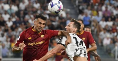 Roma's Mehmet Zeki Çelik (L) vies with Juventus' Arkadiusz Milik in a Serie A match, Turin, Italy, Aug. 27, 2022. (AA photo)