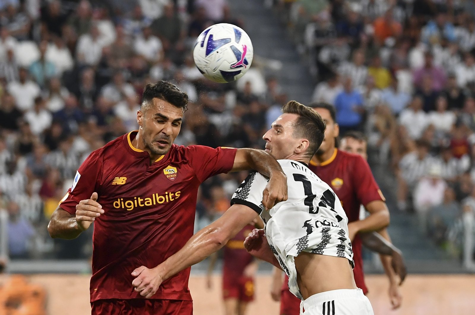 Roma&#039;s Mehmet Zeki Çelik (L) vies with Juventus&#039; Arkadiusz Milik in a Serie A match, Turin, Italy, Aug. 27, 2022. (AA photo)