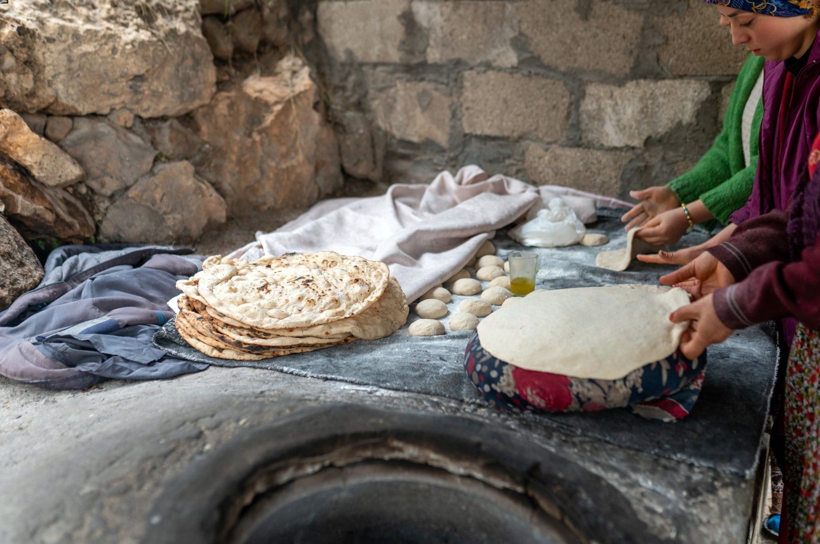 Tandoor bread is cooked in a pit dug on the ground which is also called tandoor. (Shutterstock Photo)
