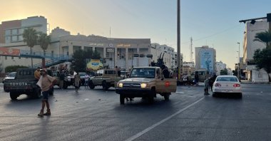 Fighters loyal to the Government of National Unity are pictured in a street in the Libyan capital Tripoli following clashes between rival Libyan groups, Aug. 27, 2022. (AFP Photo)