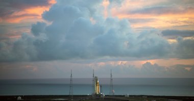 The NASA moon rocket stands ready at sunrise on Pad 39B before the Artemis 1 mission to orbit the moon at the Kennedy Space Center, in Cape Canaveral, Florida, U.S., Aug. 29, 2022. (AP Photo)