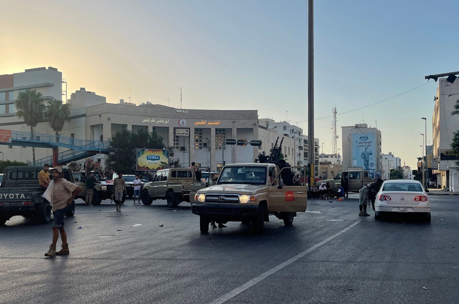 Fighters loyal to the Government of National Unity are pictured in a street in the Libyan capital Tripoli following clashes between rival Libyan groups, Aug. 27, 2022. (AFP Photo)