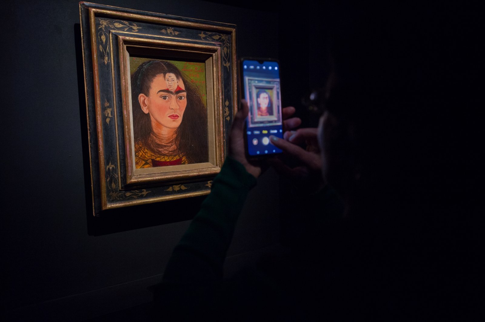 Frida Kahlo&#039;s iconic self-portrait &quot;Diego y yo,&quot; the most expensive work by a Latin American artist ever to sell at auction, is now on display in Buenos Aires. (dpa)