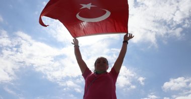 Melek Kıyı Aydın celebrates climbing her 81st summit, Ardahan, Türkiye, Aug. 30, 2022. (AA Photo)