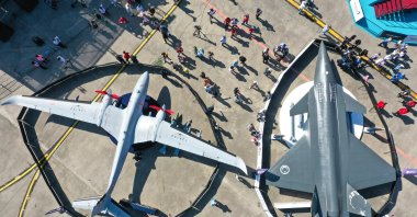 An aerial view of the Bayraktar Kızılelma (R) and Bayraktar Akıncı (L) showcased during Teknofest Black Sea, Samsun, northern Türkiye, Aug. 30, 2022. (AA Photo)