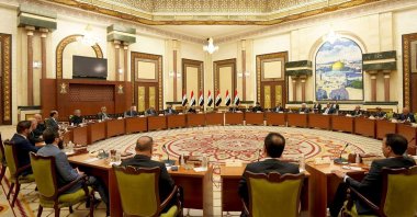 Prime Minister Mustafa al-Kadhemi speaks during the National Dialogue meeting held under the auspices of President Barham Saleh, Baghdad, Iraq, Aug. 17, 2022. (Handout photo by the Iraqi Prime Minister's Media Office via AFP)