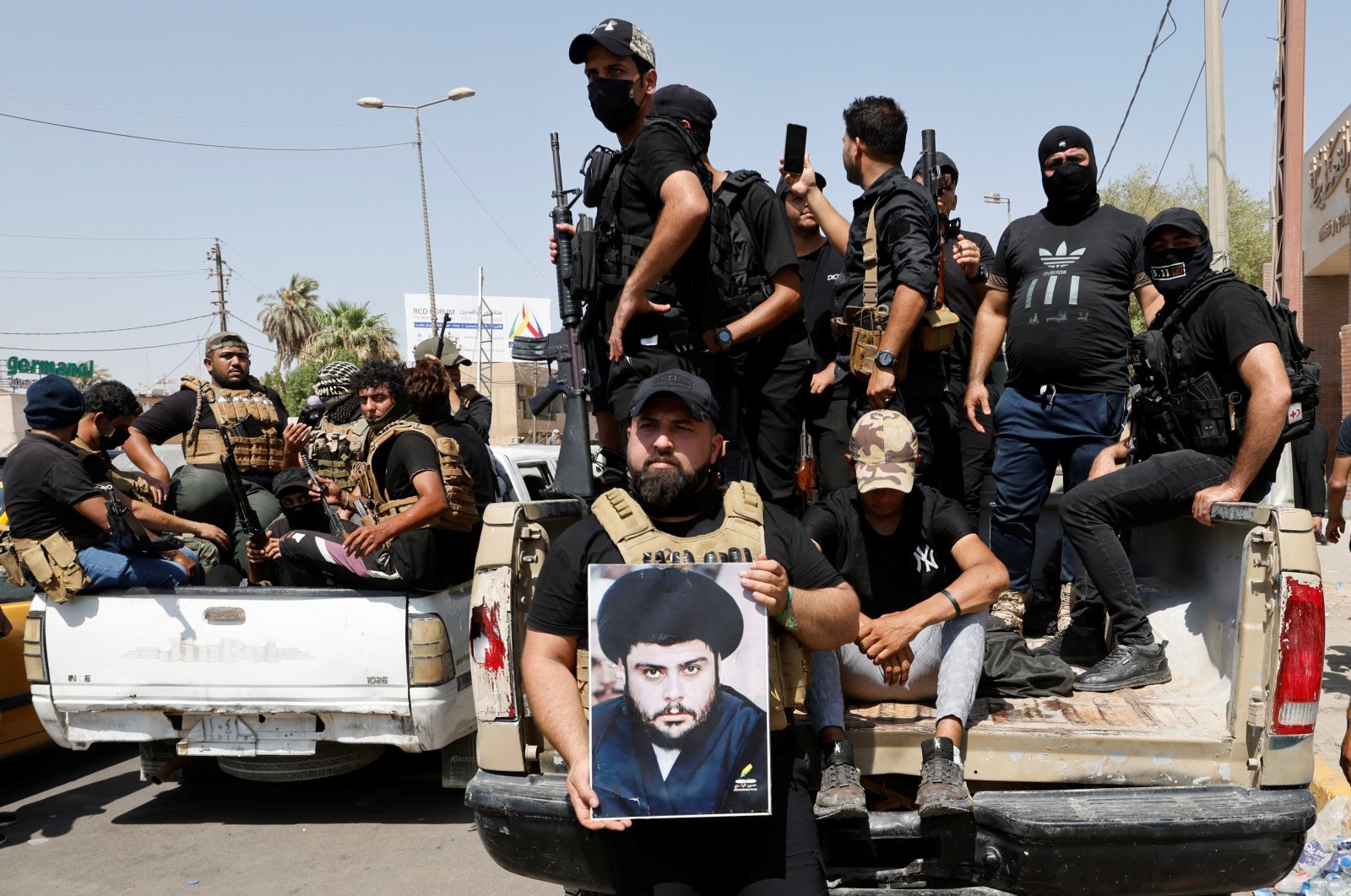 Followers of Iraqi cleric Moqtada al-Sadr withdraw from the streets after violent clashes, near the Green Zone in Baghdad, Iraq, Aug. 30, 2022. (Reuters Photo)