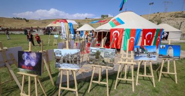 People commemorate Azerbaijan's victory in the Second Karabakh War with an exhibition in an event that is organized to mark the 951st anniversary of the Battle of Malazgirt in Bitlis, Türkiye, Aug. 23, 2022. (AA Photo)