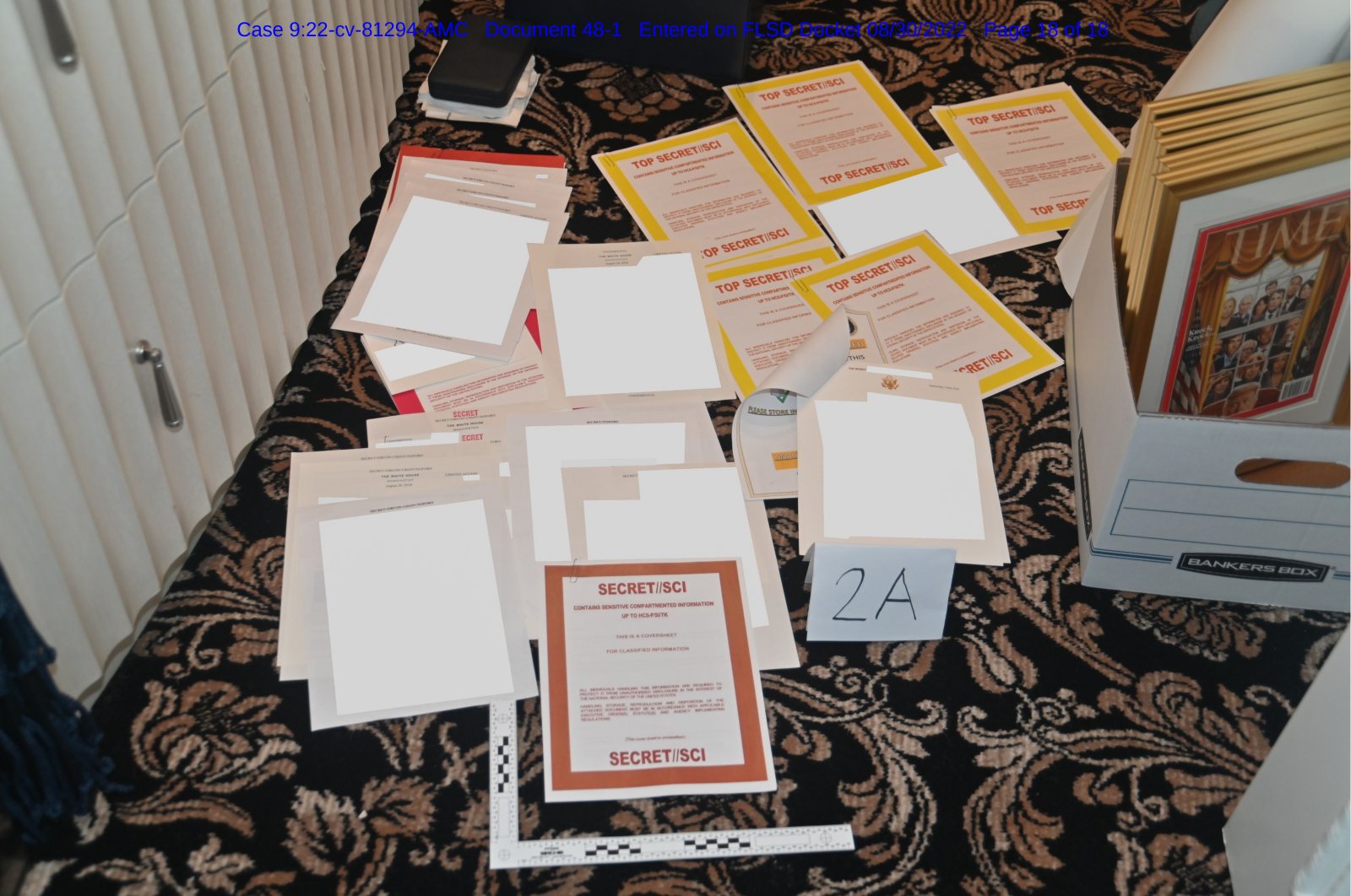 Documents seized during the Aug. 8 search by the FBI of former President Donald Trump&#039;s Mar-a-Lago estate in Florida are seen in this image contained in a court filing by the Department of Justice on Aug. 30, 2022. (Department of Justice via AP)