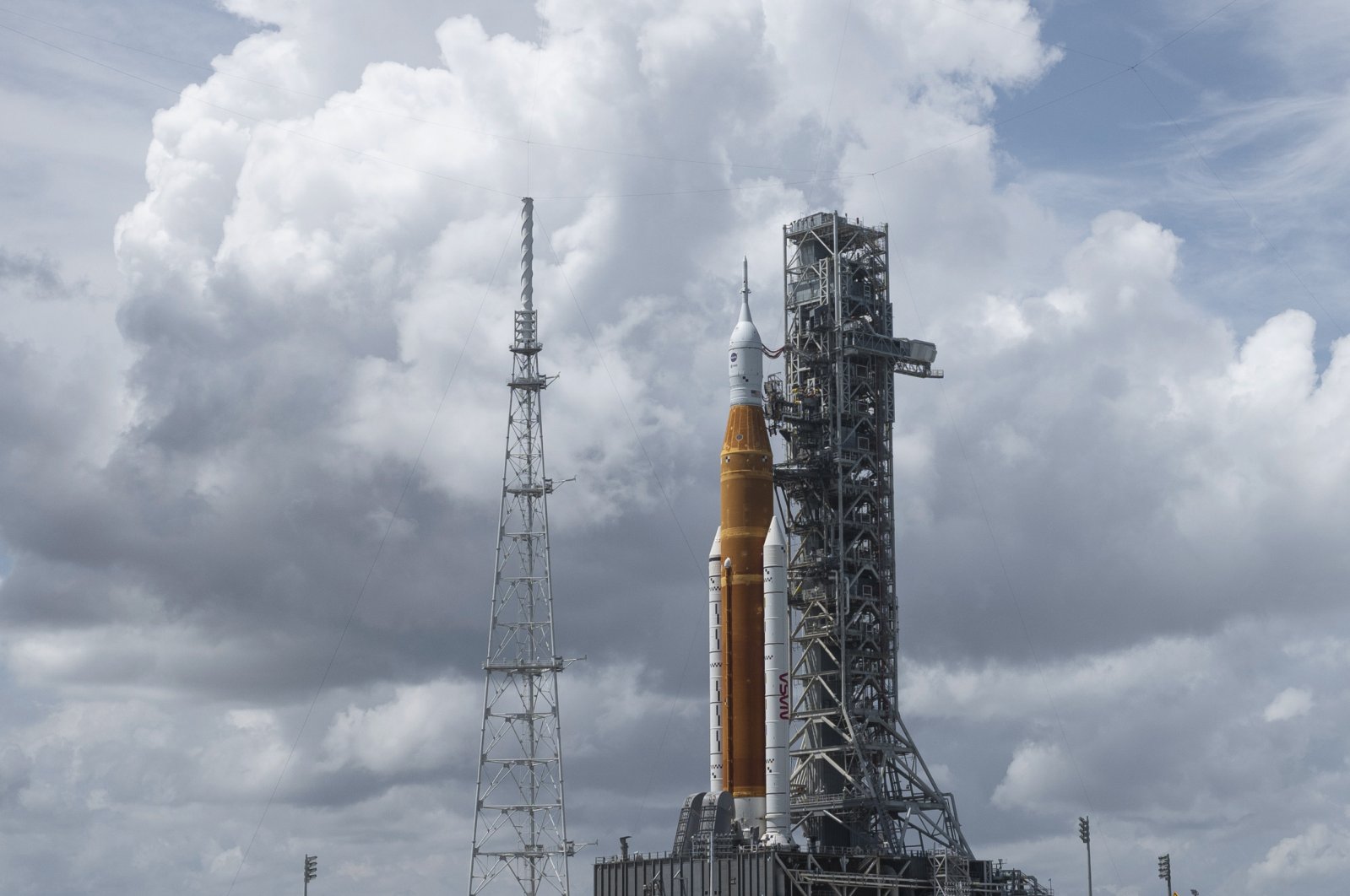 NASA&#039;s Space Launch System (SLS) rocket with the Orion spacecraft aboard is seen atop the mobile launcher at Launch Pad 39B, at Kennedy Space Center in Cape Canaveral, Florida, U.S., Aug. 30, 2022. (AP Photo)