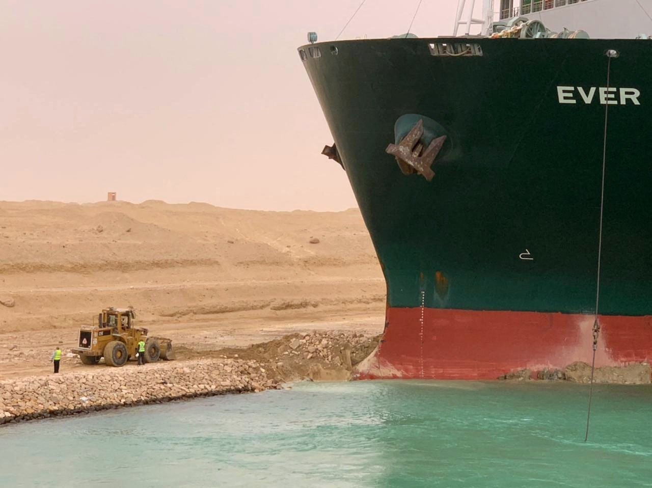 A part of the Taiwan-owned MV Ever Given lodged sideways on the waterway of Suez Canal, Egypt, March 24, 2021. (AFP Photo)
