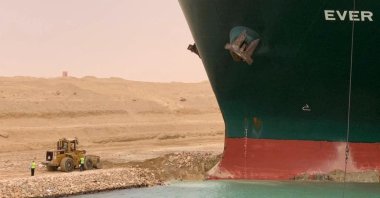 A part of the Taiwan-owned MV Ever Given lodged sideways on the waterway of Suez Canal, Egypt, March 24, 2021. (AFP Photo)
