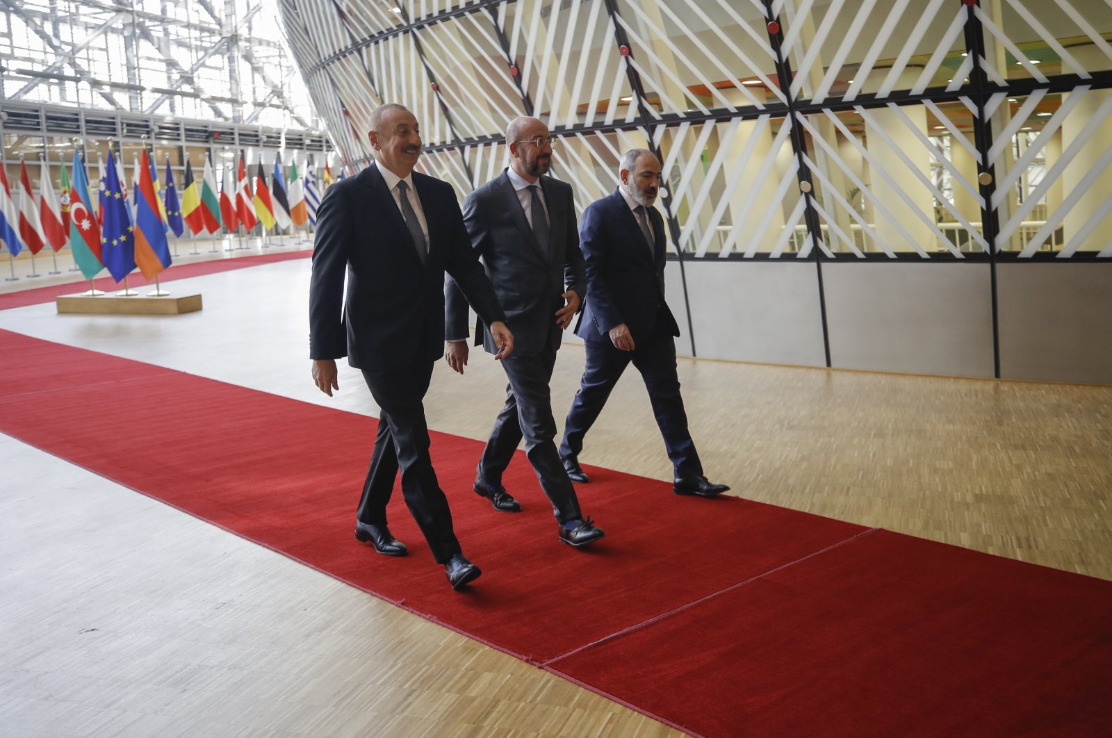 Azerbaijan&#039;s President Ilham Aliyev (L) and Armenia&#039;s Prime Minister Nikol Pashinian are welcomed by European Council President Charles Michel (C) in Brussels, Belgium, Aug. 31, 2022. (EPA Photo)
