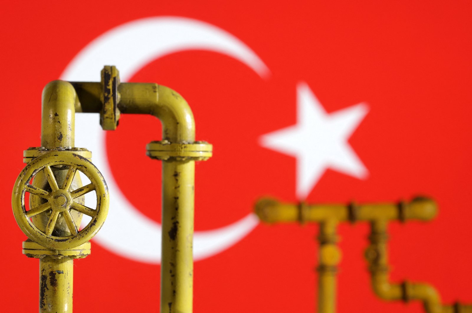 This illustration shows natural gas pipeline and Türkiye flag, July 18, 2022. (Reuters Photo)