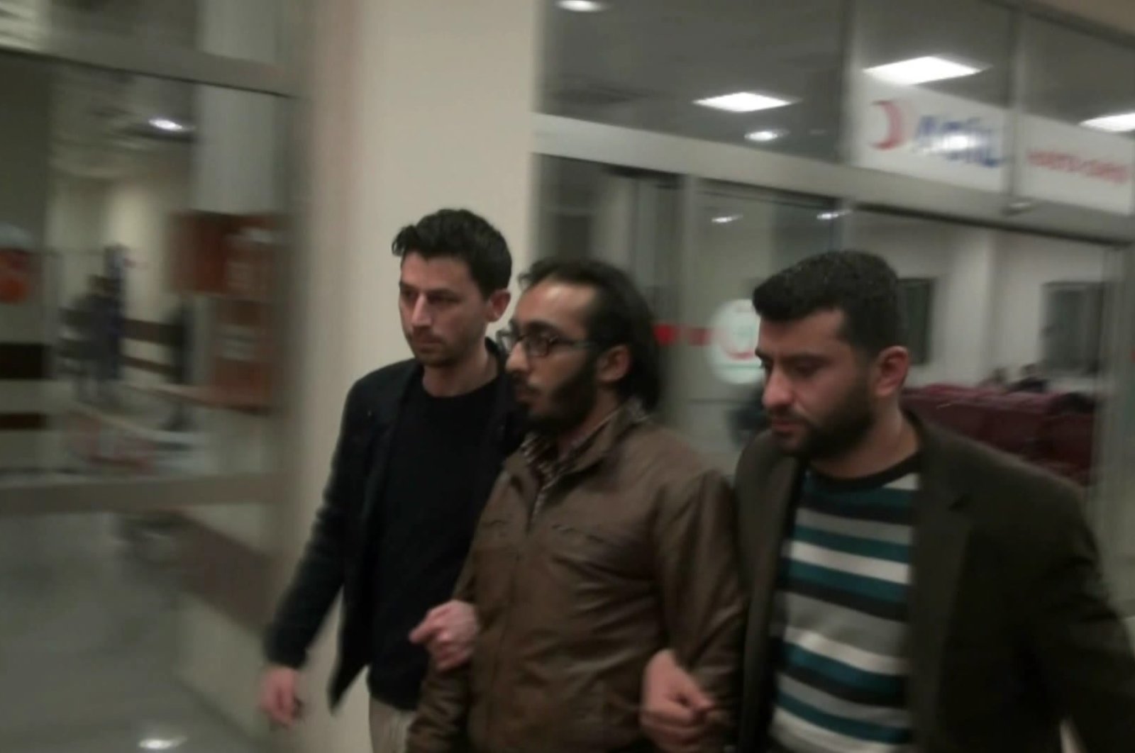 Security officers escort Mohammed al-Rasheed after his detention in Şanlıurfa, March 15, 2015. (A HABER PHOTO)