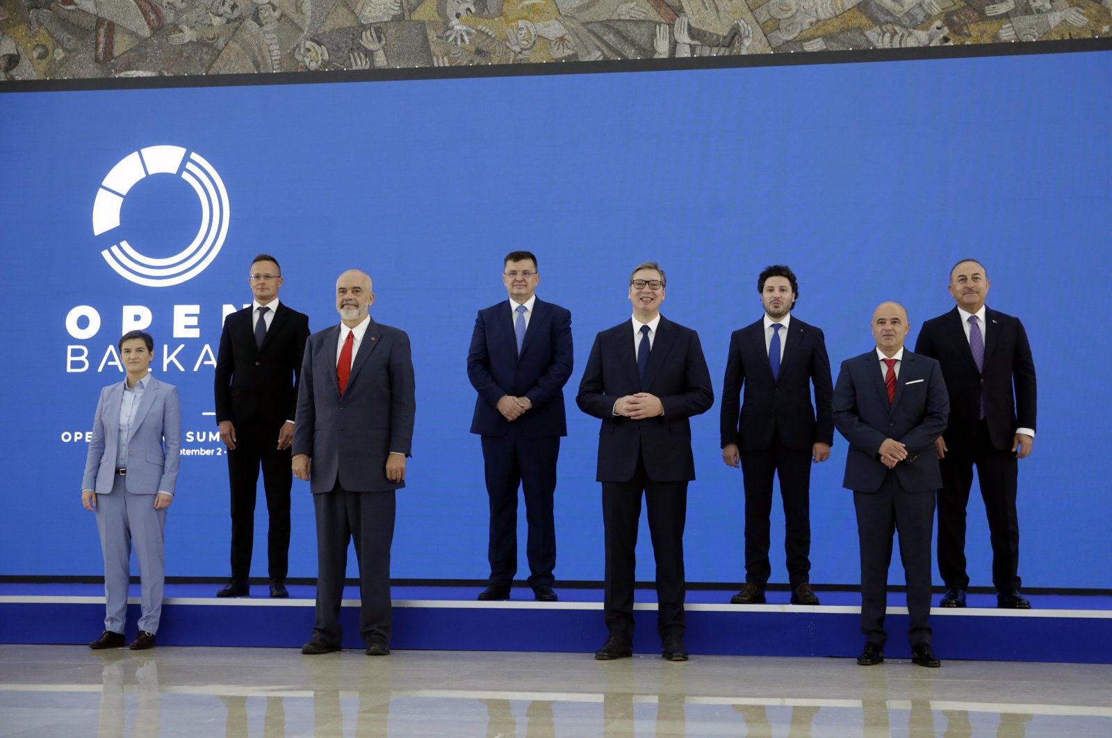 (First row from the left) Serbian Prime Minister Ana Brnabic, Albania&#039;s Prime Minister Edi Rama, Serbian President Aleksandar Vucic and North Macedonia&#039;s Prime Minister Dimitar Kovacevski, (second row from left) Hungary&#039;s Foreign Minister Peter Szijjarto, Chairman of the Council of Ministers of Bosnia and Herzegovina Zoran Tegeltija, Montenegro&#039;s Prime Minister Dritan Abazovic and Turkish Foreign Minister Mevlüt Çavuşoğlu pose for a family photo before the during the Open Balkan economic summit for regional cooperation in Belgrade, Serbia, Sept. 2, 2022.  (EPA Photo)