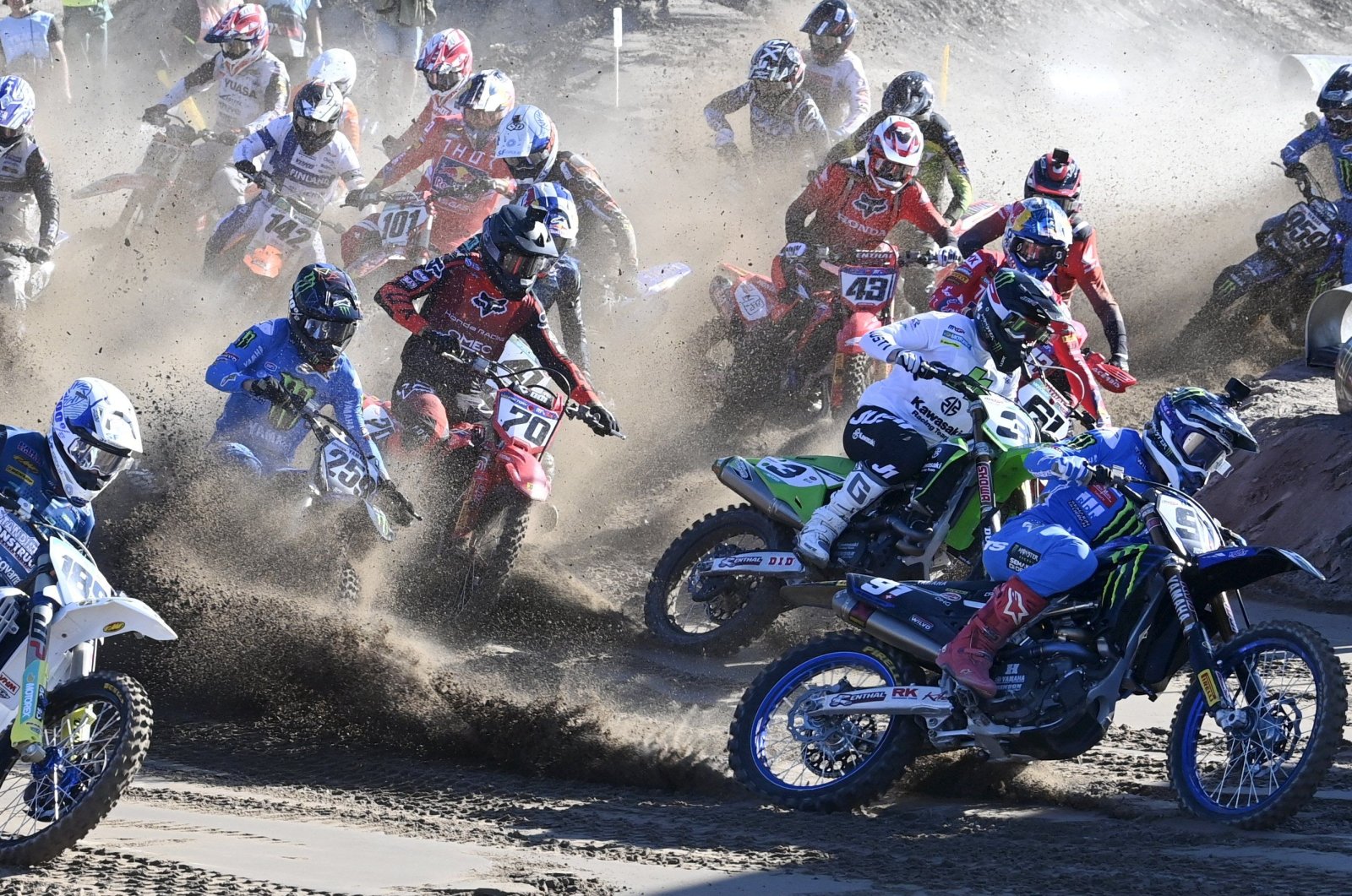 Riders compete during the start of the MXGP qualification race in Hyvinka, Finland, Aug 13, 2022. (AFP Photo)