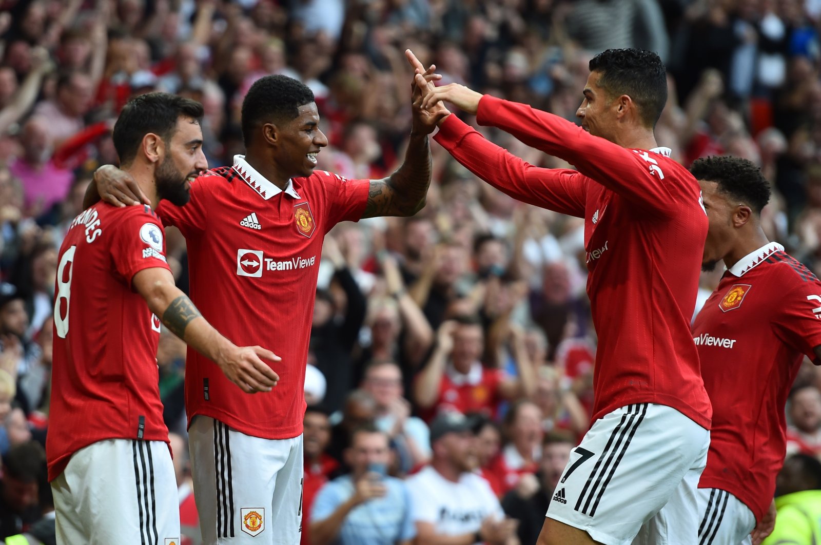 Marcus Rashford (2-L) of Manchester United celebrates after scoring during the English Premier League soccer match between Manchester United and Arsenal FC in Manchester, Britain, Sept. 4, 2022.  (EPA Photo)