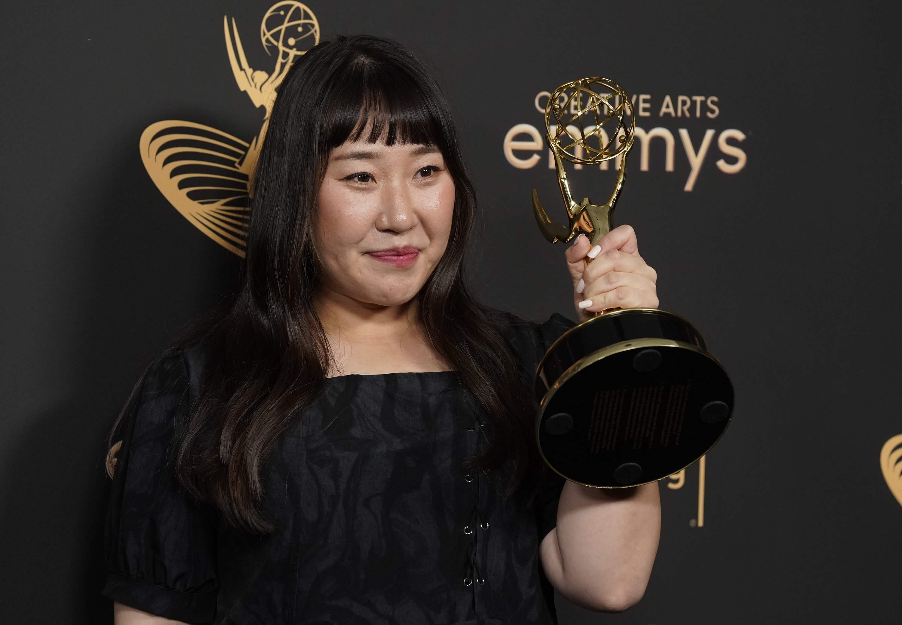 Gim En-jee poses in the press room with the award for outstanding production design for a narrative contemporary program for "Squid Game" at the Creative Arts Emmy Awards, Los Angeles, U.S. (AP Photo)