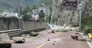 Fallen rocks are seen on a road near Lengqi Town in Luding County, Sichuan Province, China, Sept. 5, 2022. (Xinhua via AP)
