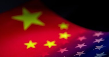 The flags of China and the United States are seen printed on paper in this illustration taken on Jan. 27, 2022. (Reuters Photo)