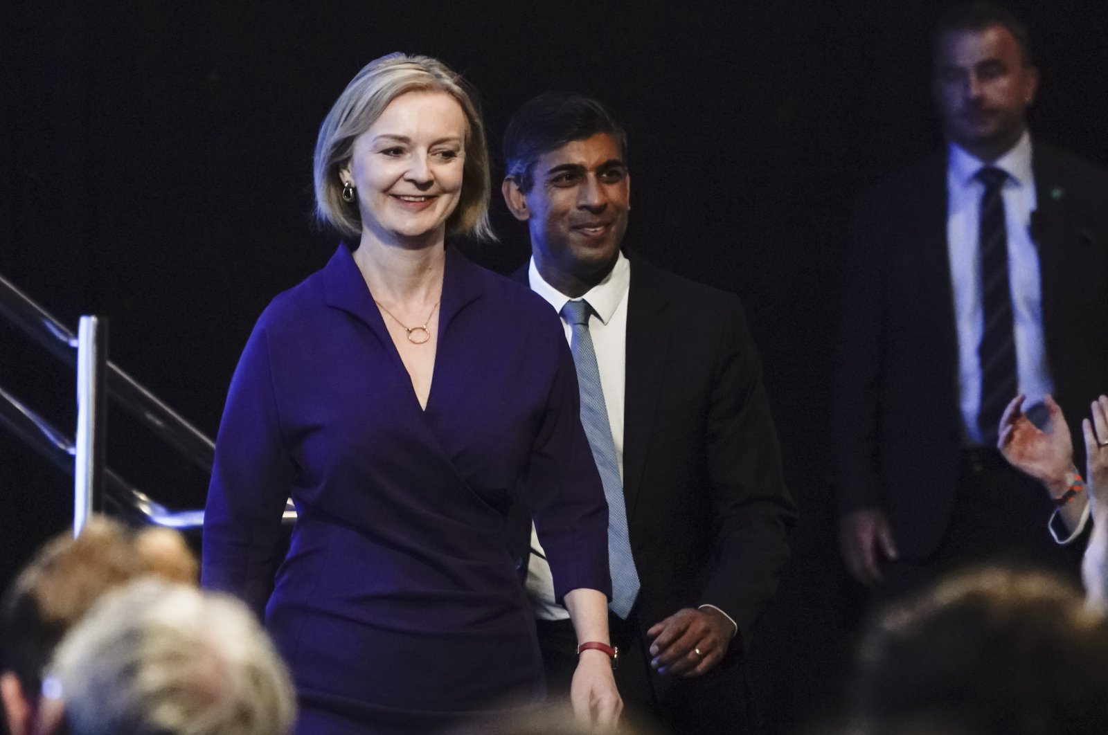 Liz Truss (L) and Rishi Sunak (C) arrive for the announcement of the result of the Conservative Party leadership contest at the Queen Elizabeth II center in London, U.K., Sept. 5, 2022. (AP Photo)