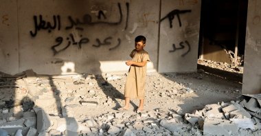 A Palestinian boy walks in the house of Raed Hazem after it was demolished by Israeli forces in Jenin, in the Israeli-occupied West Bank, Palestine, Sept. 6, 2022. (Reuters Photo)