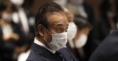 Haruyuki Takahashi, executive board member of the Tokyo Olympics Organizing Committee, attends a meeting, Tokyo, Japan, March 30, 2020. (AP Photo)
