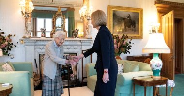 Queen Elizabeth (L) welcomes Liz Truss during an audience where she invited the newly elected leader of the Conservative party to become prime minister and form a new government, at Balmoral Castle, Scotland, U.K, Sept. 6, 2022. (Reuters Photo)