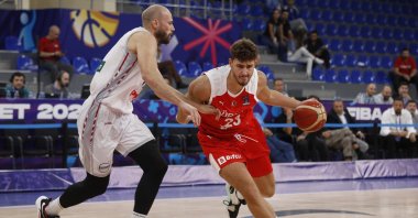 Türkiye's NBA stars Alperen Şengün in action against Belgium's Pierre-Antoine Gillet, Tbilisi, Georgia, Sept. 6, 2022. (AA Photo)