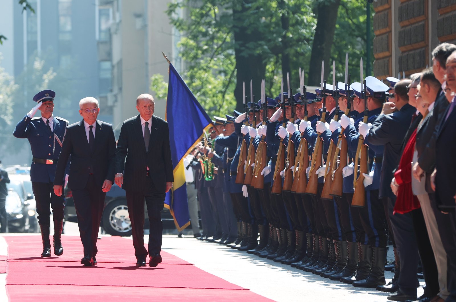 Chair of the Presidency of Bosnia-Herzegovina Sefik Dzaferovic (2nd L) and President Recep Tayyip Erdoğan review the honor guard during a welcoming ceremony in Sarajevo, Bosnia-Herzegovina, Sept. 6, 2022. (AA Photo)