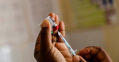 A nurse fills a syringe with malaria vaccine before administering it to an infant at the Lumumba Sub-County hospital in Kisumu, Kenya, July 1, 2022. (Reuters Photo)