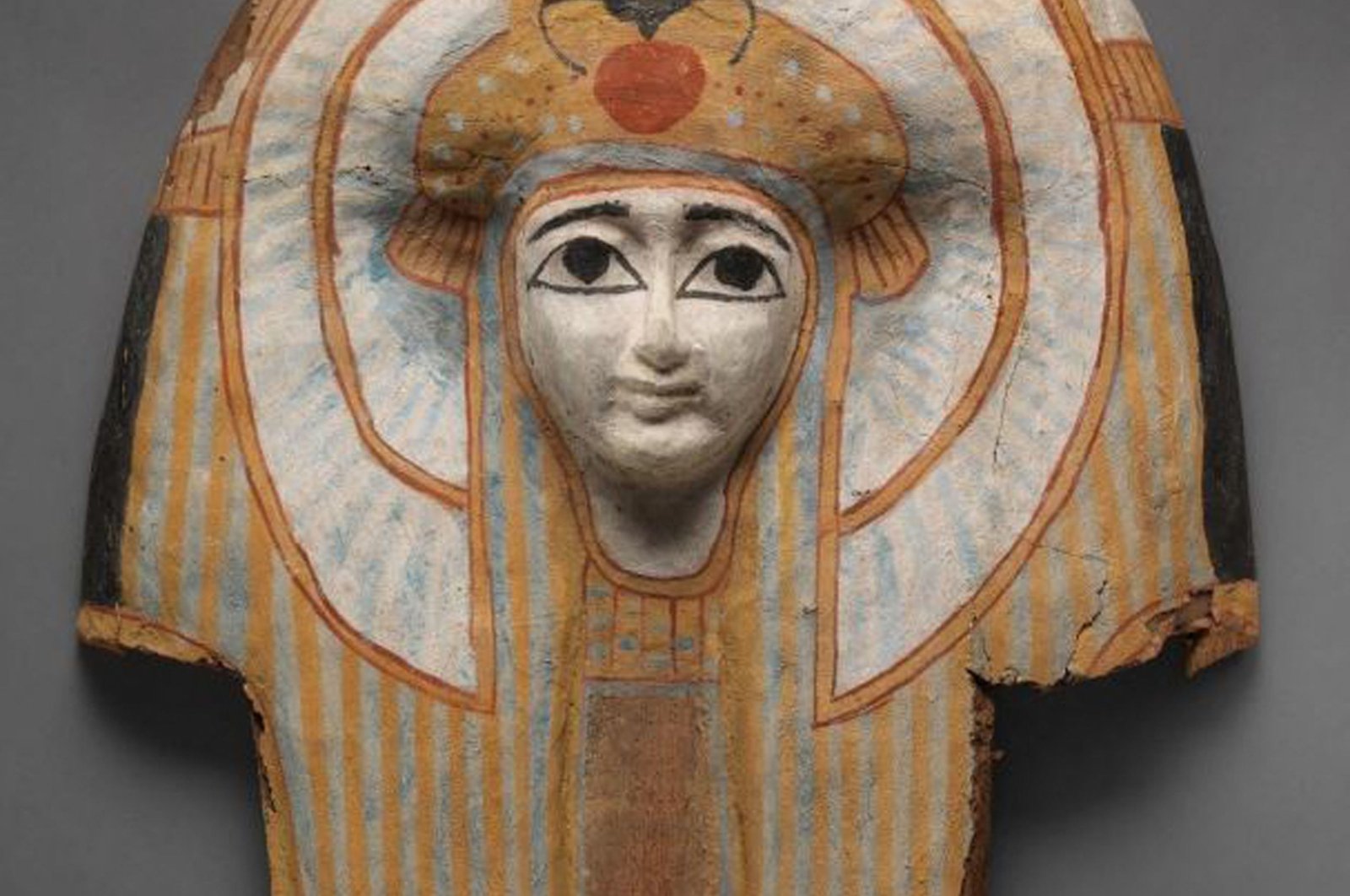 A face from a painted wooden Egyptian coffin dated around 945-712 BC is seen in this image released in a search warrant issued by the Supreme Court of the State of New York on May 19, 2022. (AFP Photo)