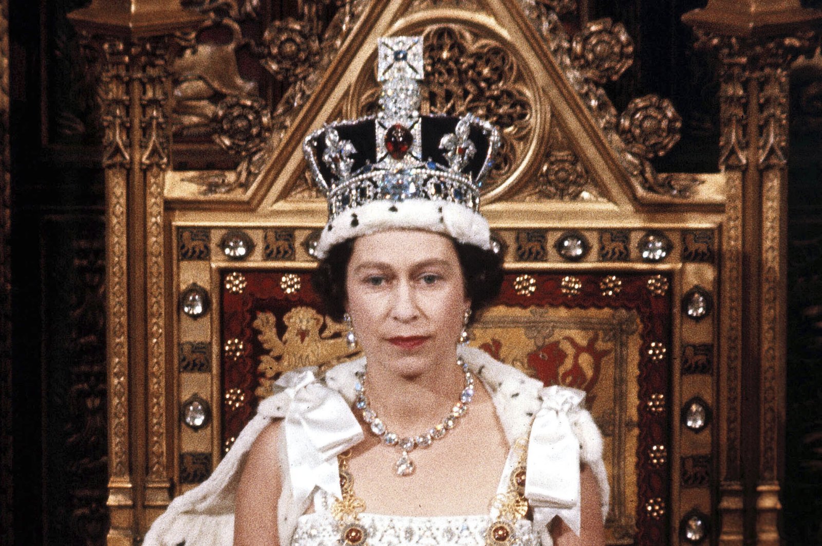 In this April 1966 file photo, Britain&#039;s Queen Elizabeth II is seen during the State Opening of Parliament, London, England. Queen Elizabeth II, Britain’s longest-reigning monarch and a rock of stability across much of a turbulent century, has died. She was 96. Buckingham Palace made the announcement in a statement on Thursday, Sept. 8, 2022. (AP File Photo)