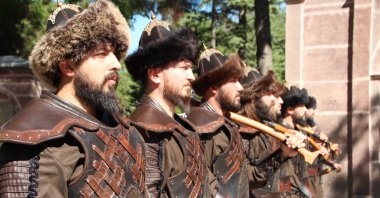 Soldiers dressed as Ertuğrul's "alps" attend a ceremony to remember him, in Bilecik, southwestern Türkiye, Sept. 9, 2022. (İHA PHOTO) 