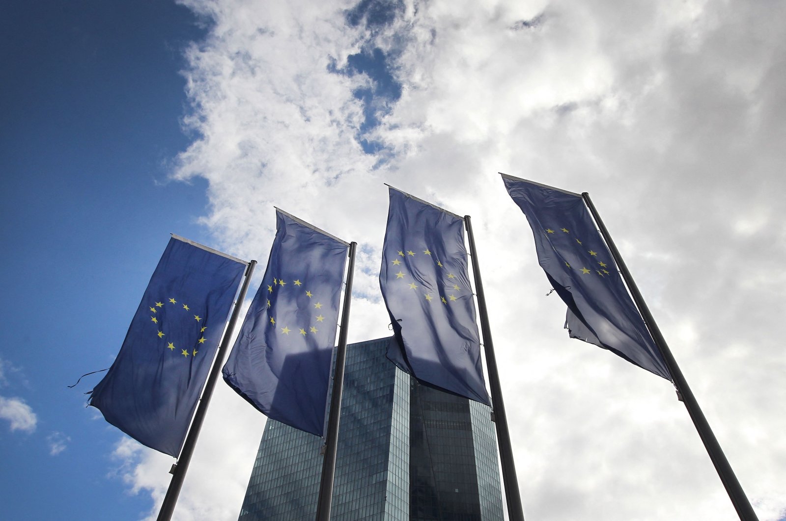 The flags of the European Union flutter in front of the headquarters of the European Central Bank (ECB) in Frankfurt am Main, Germany, Sept. 8, 2022. (AFP Photo)