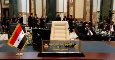 The empty seat of the Syrian delegation is seen during the Arab summit in Kuwait City, Kuwait, March 25, 2014. (Reuters Photo)