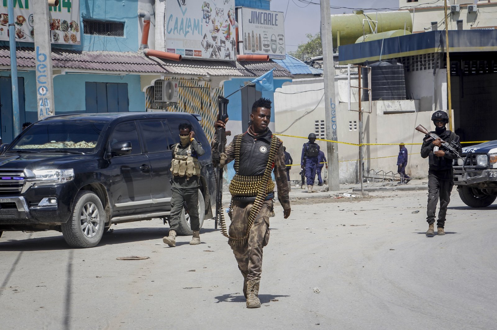 Security forces patrol at the scene, after gunmen stormed a hotel in the capital Mogadishu, Somalia, Aug. 21, 2022. (AP Photo)