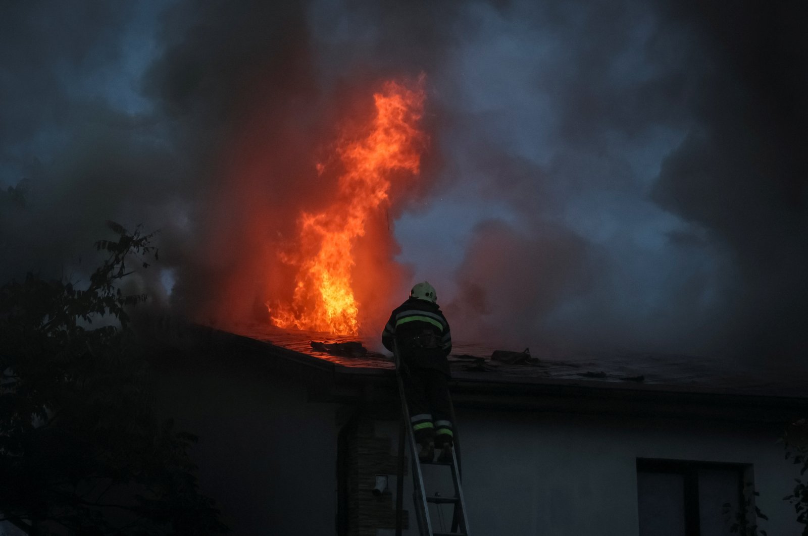 Ukrainian firefighters put out a fire in a residential house after a Russian military strike, as Russia&#039;s attack on Ukraine continues, in Kharkiv, Ukraine, Sept. 10, 2022. (Reuters Photo)