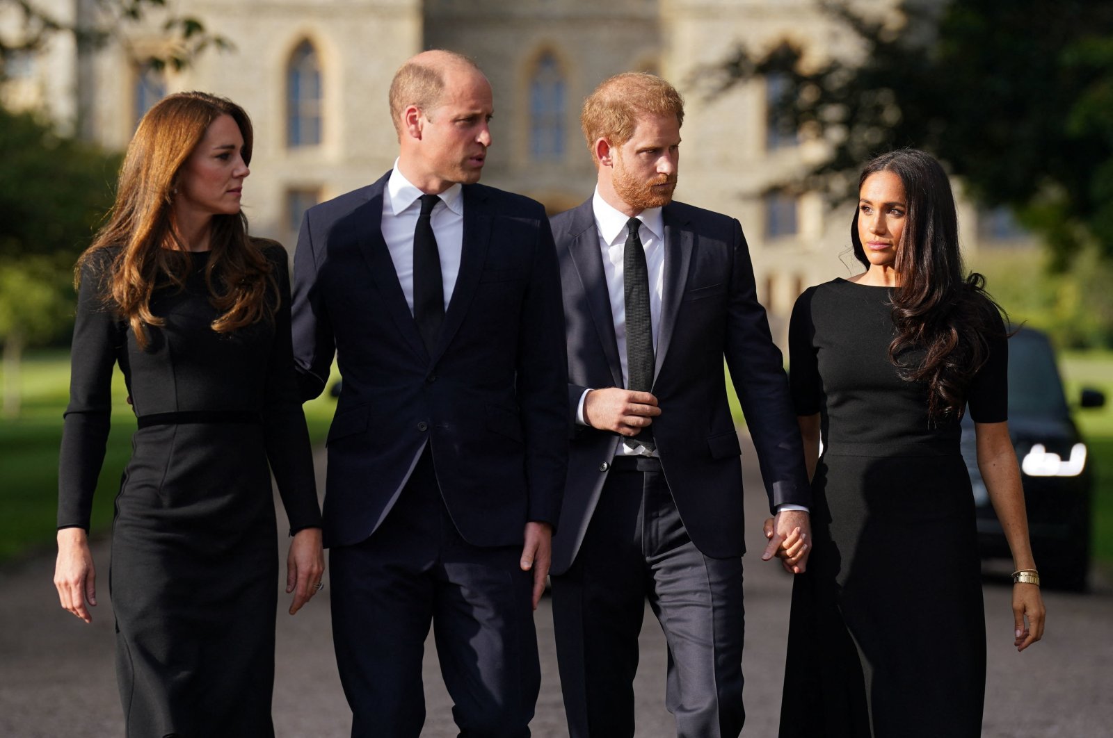 (Left to right) Britain&#039;s Catherine, Princess of Wales, Britain&#039;s Prince William, Prince of Wales, Britain&#039;s Prince Harry, Duke of Sussex, and Meghan, Duchess of Sussex, on the Long Walk at Windsor Castle, U.K., Sept. 10, 2022. (AFP Photo)