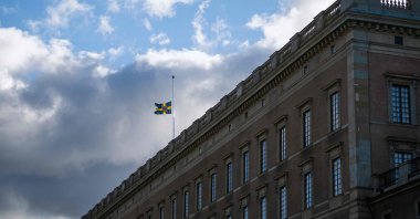 The Swedish flag flies at half-mast atop the Royal Palace in Stockholm, Sweden, Sept. 9, 2022. (AFP Photo)