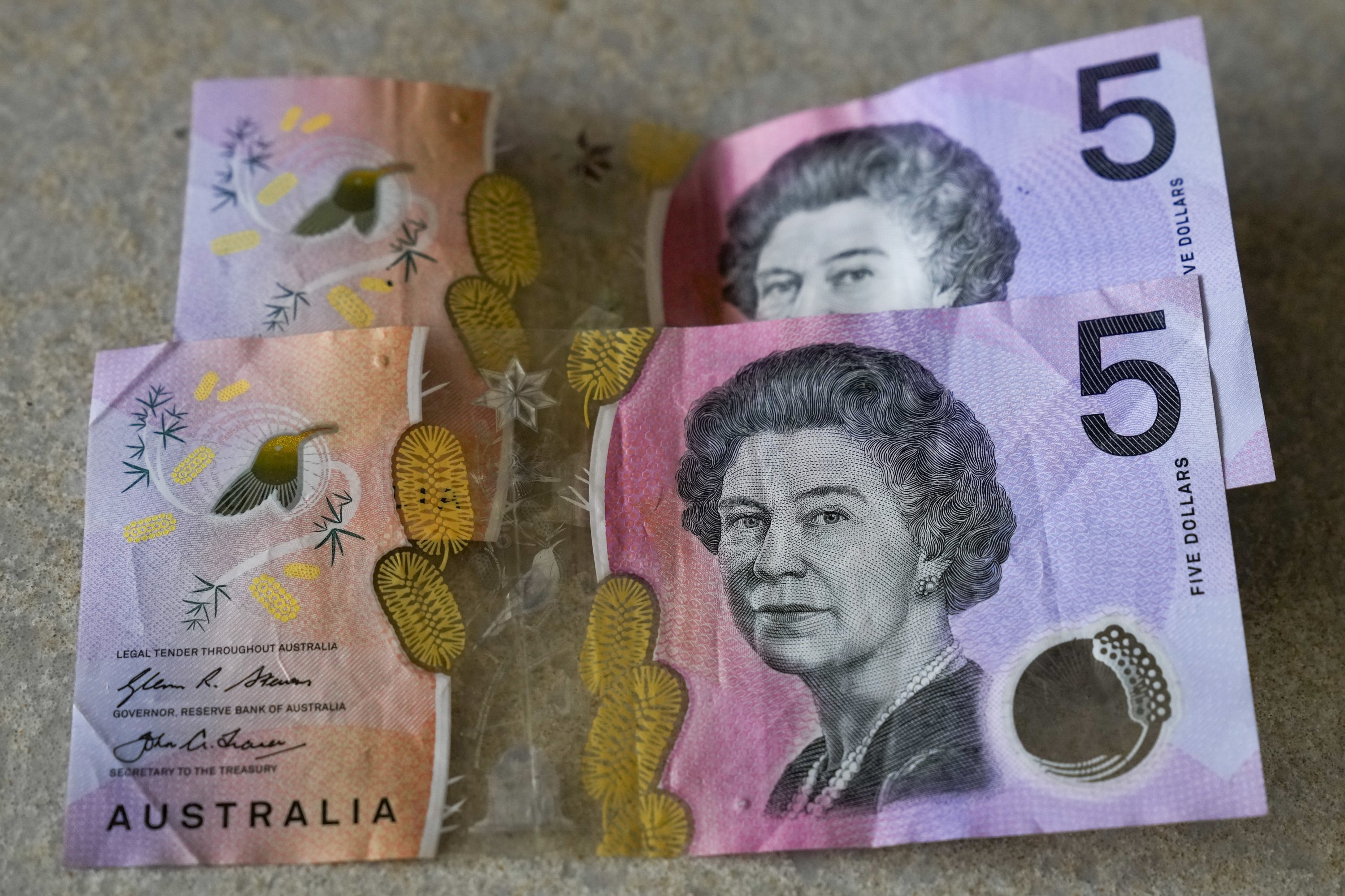 Australian $5 notes are pictured in Sydney, Sept. 10, 2022. (AP)