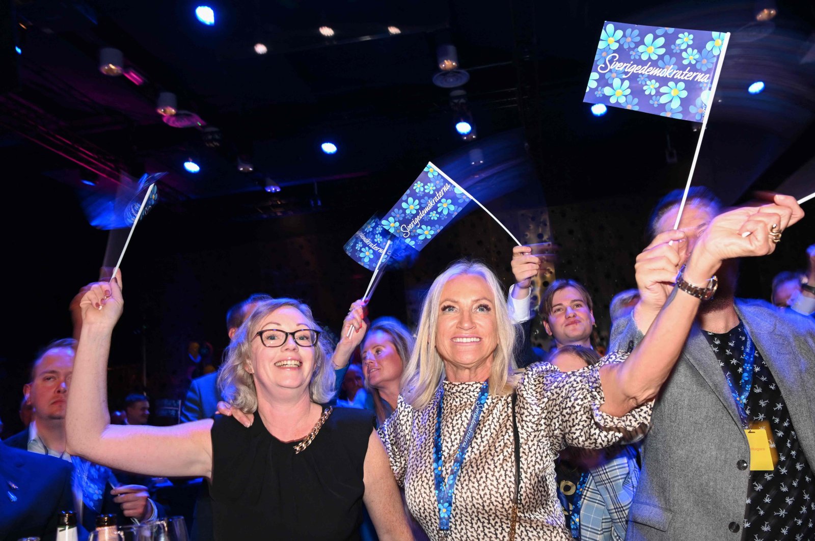 Supporters of the Sweden Democrats cheer during the Party&#039;s election night after exit polls were released, in Nacka, near Stockholm, Sweden, Sept. 11, 2022. (AFP Photo)