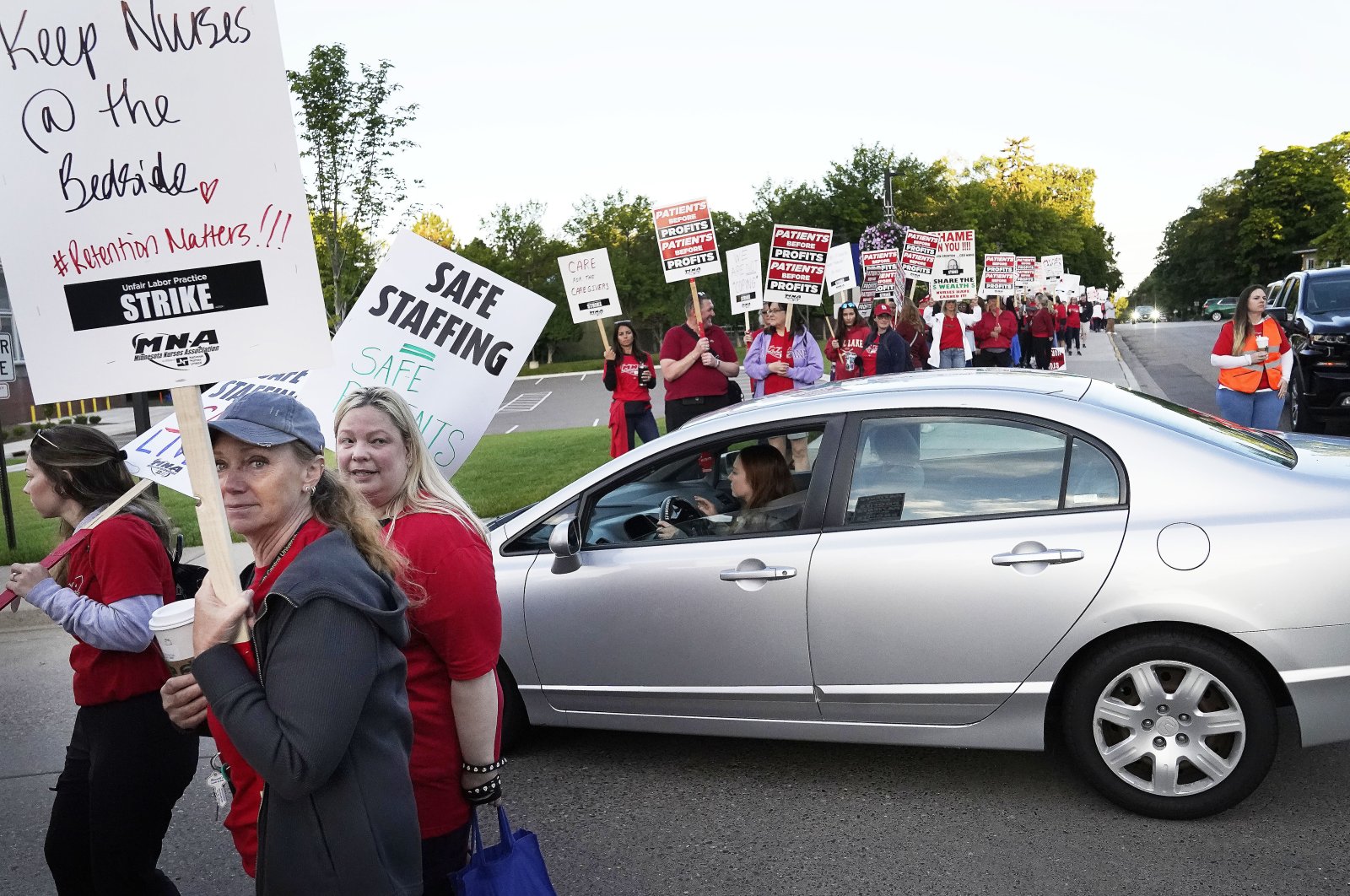 Nurses strike outside North Memorial Health Hospital in Robbinsdale, Minnesota, U.S., Sept. 12, 2022. (AP Photo)