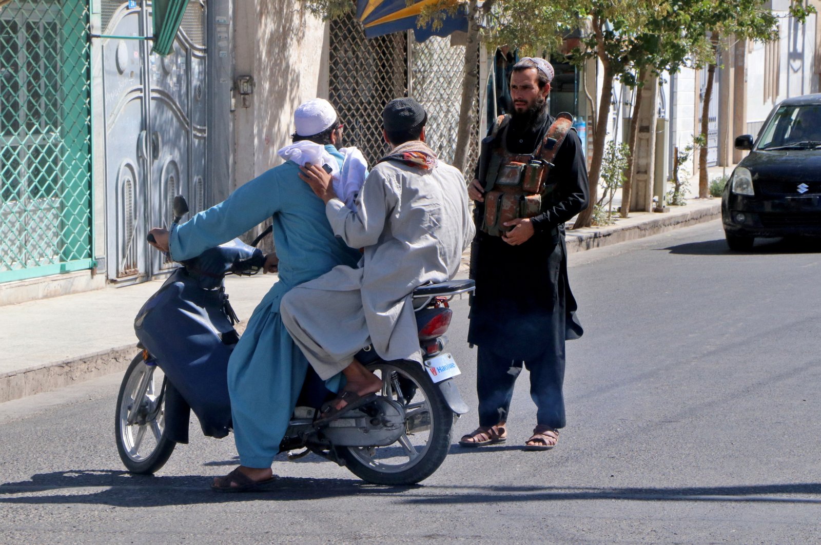 A Taliban fighter stops motorists on a road after a blast outside a mosque in Herat in western Afghanistan, Sept. 2, 2022. (Reuters File Photo)