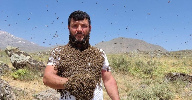 Mehmet Hadi Yıldırım, who has been a beekeeper since his childhood in Türkiye&#039;s southeastern Batman is able to keep a hive of bees on his body, Türkiye, Sept. 13, 2022. (Sabah Photo)