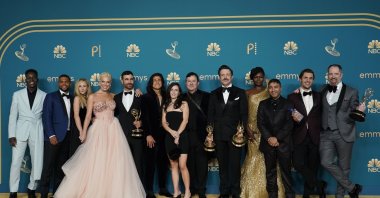 The cast of &quot;Ted Lasso,&quot; winner of the Emmy for outstanding comedy series, pose in the press room at the 74th Primetime Emmy Awards on Sept. 12, 2022, at the Microsoft Theater in Los Angeles. (AP Photo)