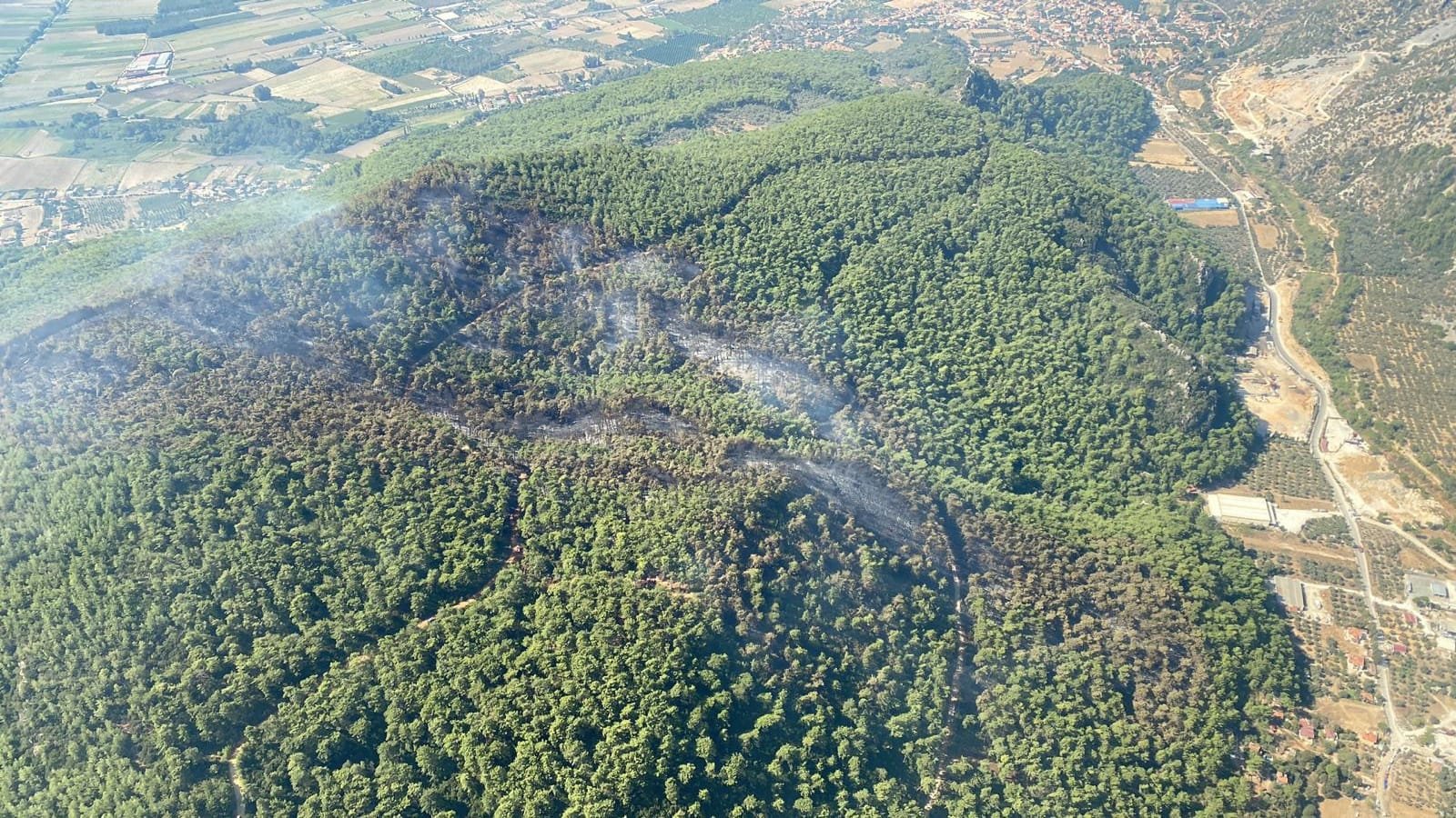 An aerial view of the affected area in a forest fire in Muğla, southwestern Türkiye, Sept. 14, 2022. (AA Photo)