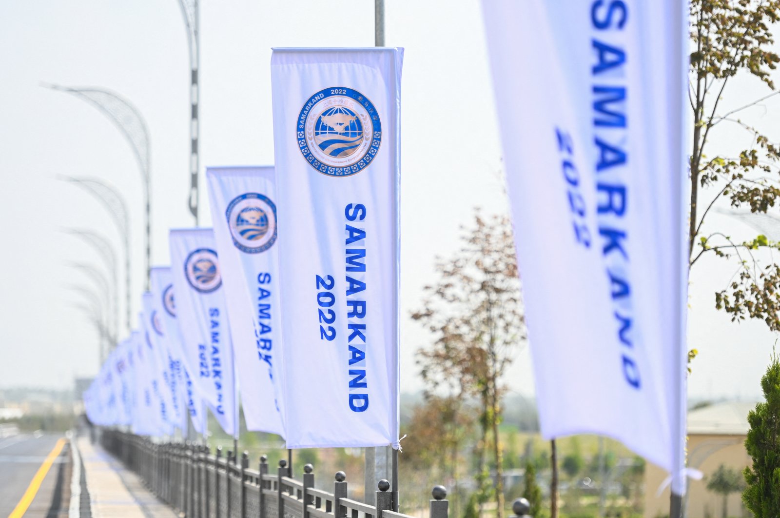 Flags fly by the road ahead of the Shanghai Cooperation Organization (SCO) summit in Samarkand, Uzbekistan, Sept. 10, 2022. (Reuters Photo)